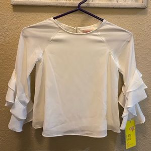White ruffle sleeved blouse
